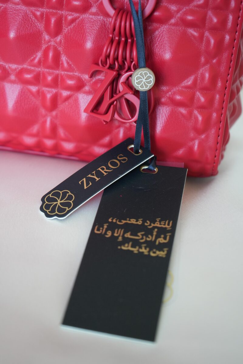 ⁦شنطة نسائية لون احمر⁩ - الصورة ⁦2⁩