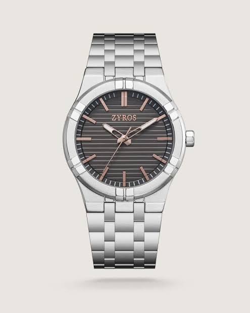 ساعه رجالي لون فضي مدور